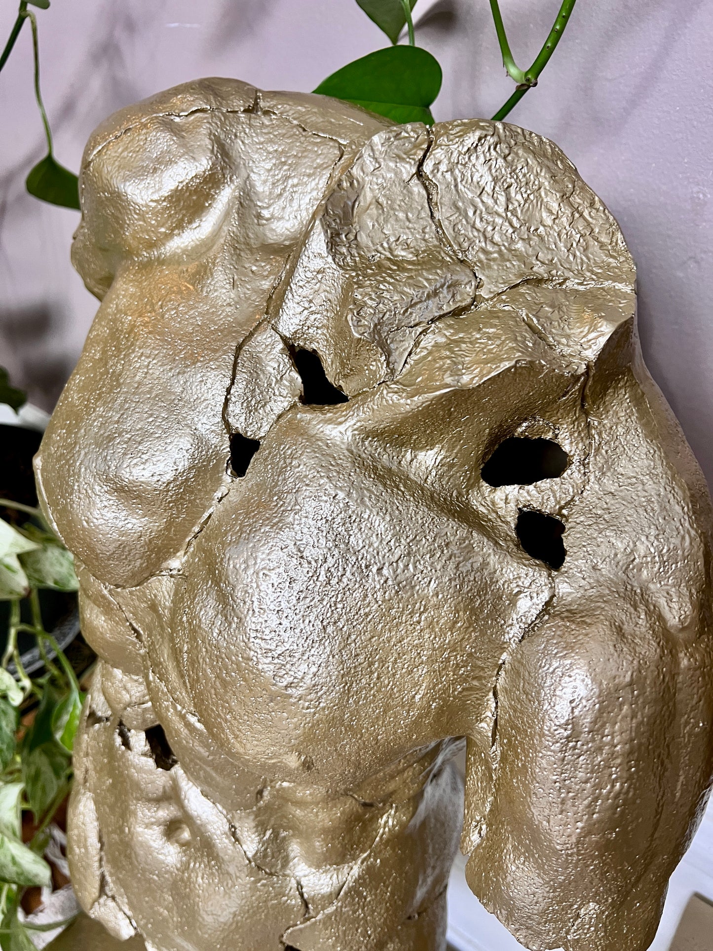 The Golden Torso Statue