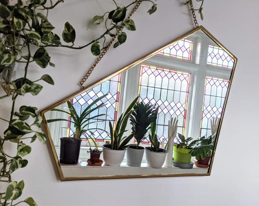 The Abstract Pentagon Mirror