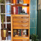 The Falcon Crest Teak Cabinet
