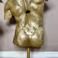 The Golden Torso Statue