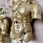 The Golden Torso Statue