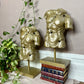 The Golden Torso Statue