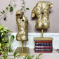 The Golden Torso Statue