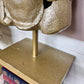 The Golden Torso Statue