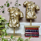 The Golden Torso Statue