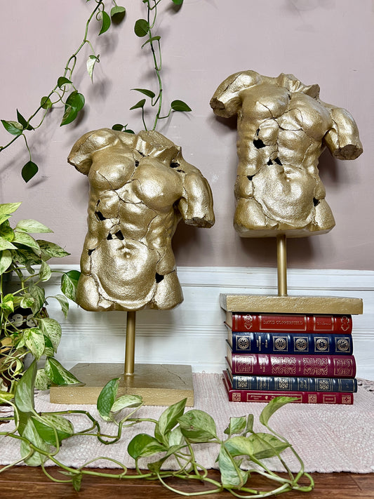 The Golden Torso Statue
