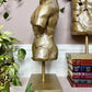 The Golden Torso Statue