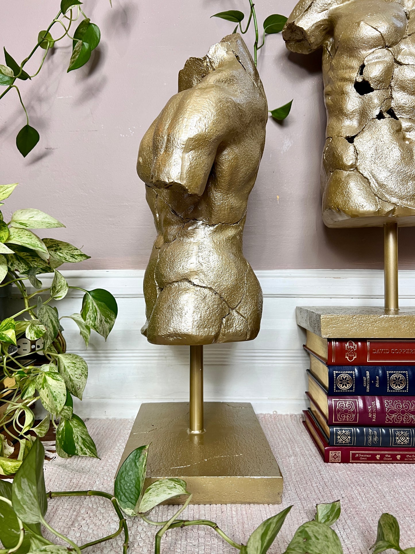 The Golden Torso Statue