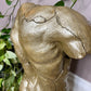 The Golden Torso Statue