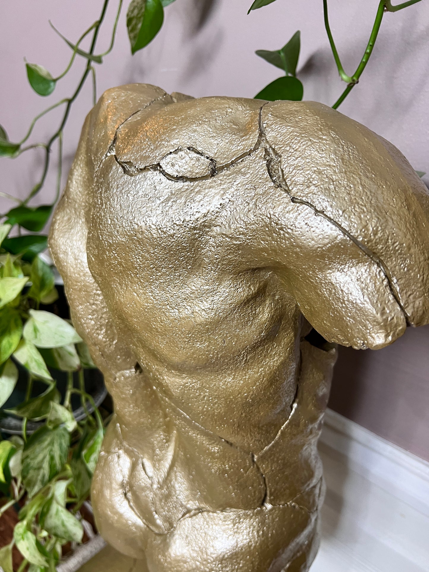 The Golden Torso Statue