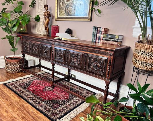 This is a stunning antique sideboard credenza made from solid wood, it's gothic Jacobean style. 