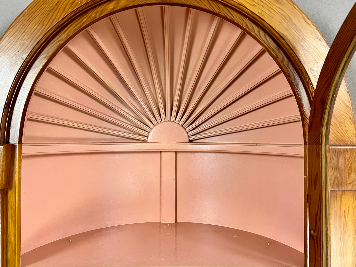 The Pink Clamshell Corner Cabinet