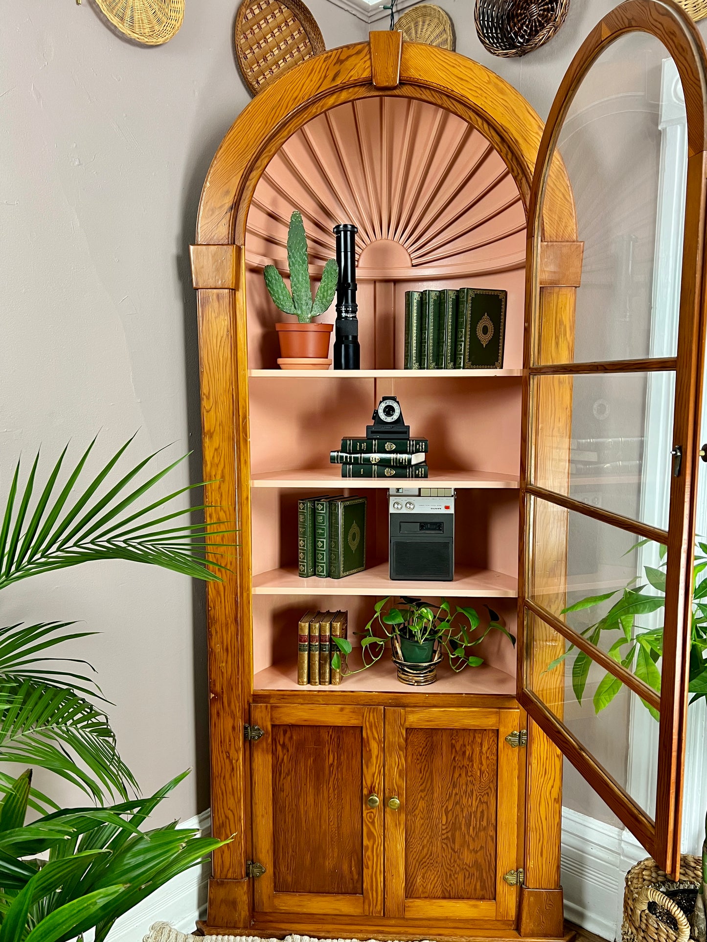 The Pink Clamshell Corner Cabinet