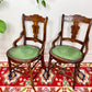 These are antique eastlake chairs with walnut frame and mint green vinyl seats.