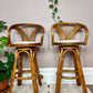 These are vintage honey coloured bentwood bar stools that swivel. 
