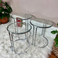 These are 3 glass and chrome circular nesting tables from the 1960s.