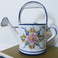 The Portuguese Watering Can