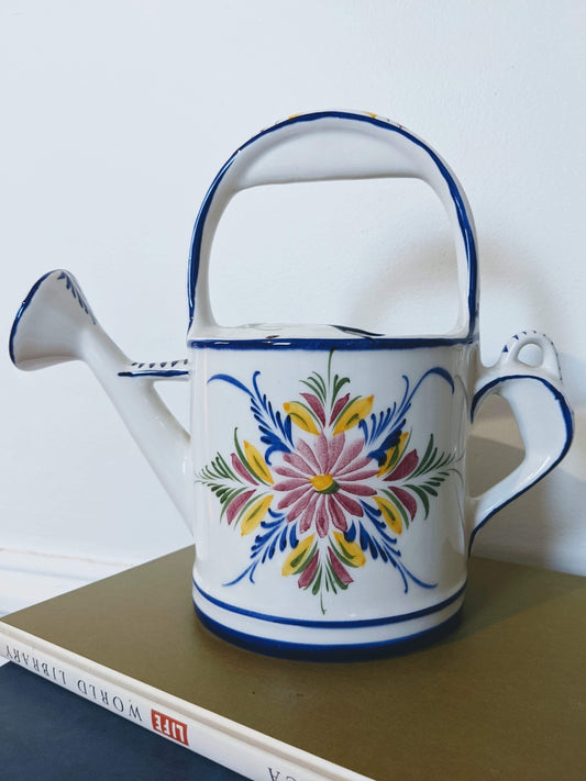 The Portuguese Watering Can
