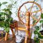 The Spinning Wheel Plant Stand