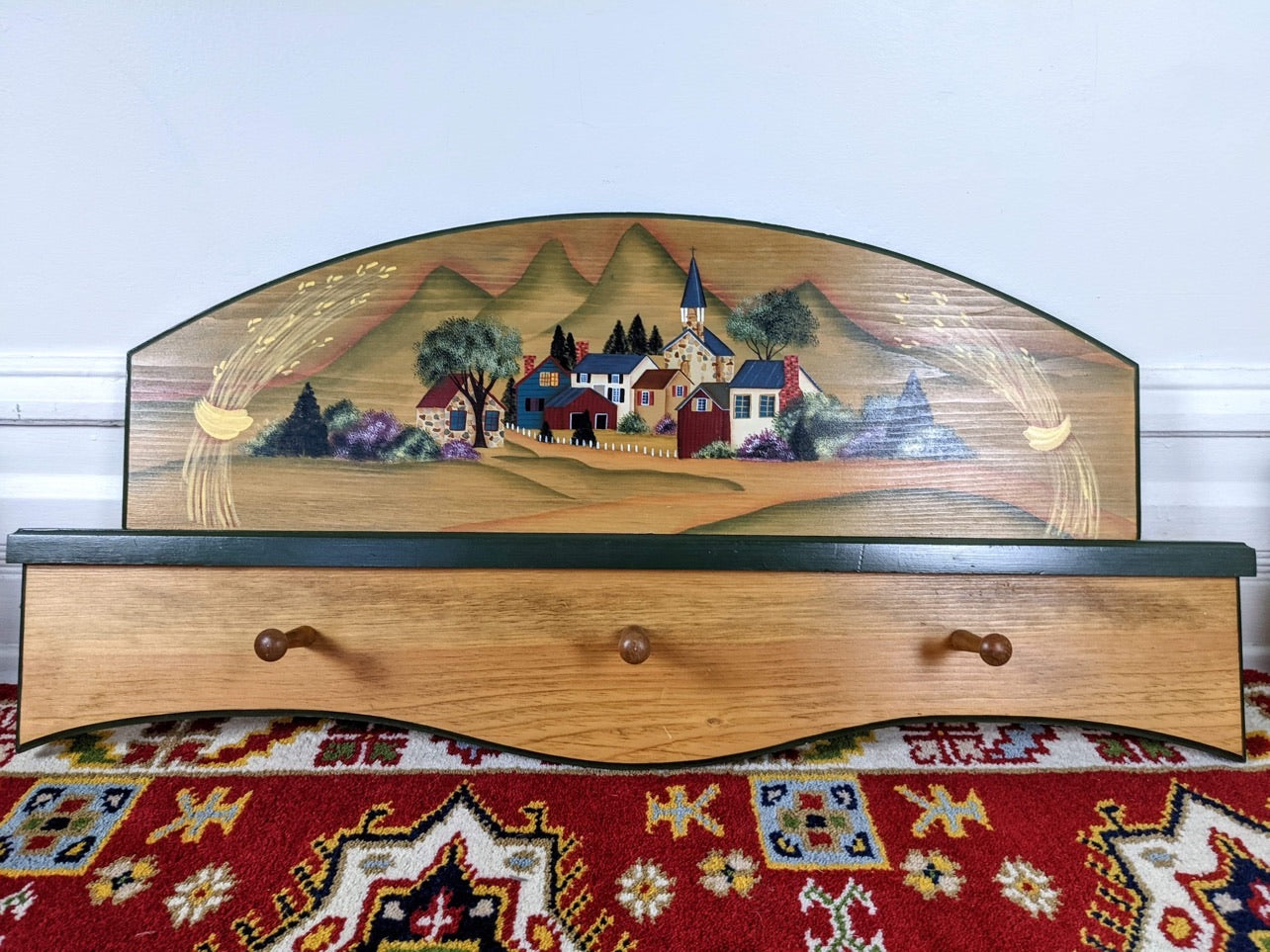 The Happy Town Coat Hanger