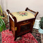 Antique Organ Piano Bench with needle point rose cushion with engraved door and storage for sheet music