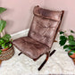 This is a 1960s Brown Leather Siesta Chair made in Norway by Ingmar Relling.