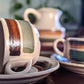 Vintage retro 70's style ceramic coffee cups green brown orange stripes cream jug saucer made in france victoria bc canada thrift