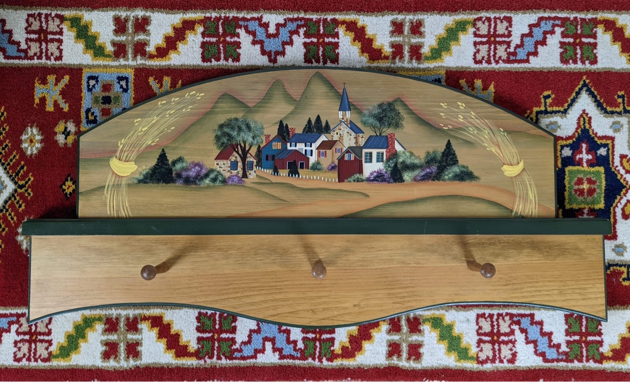 The Happy Town Coat Hanger