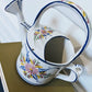 The Portuguese Watering Can