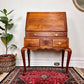 This is a beautiful custom made solid fruit wood secretary desk.