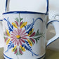 The Portuguese Watering Can