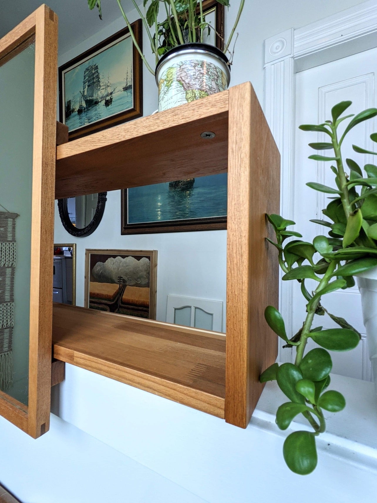 The Sliding Mirror Shelf